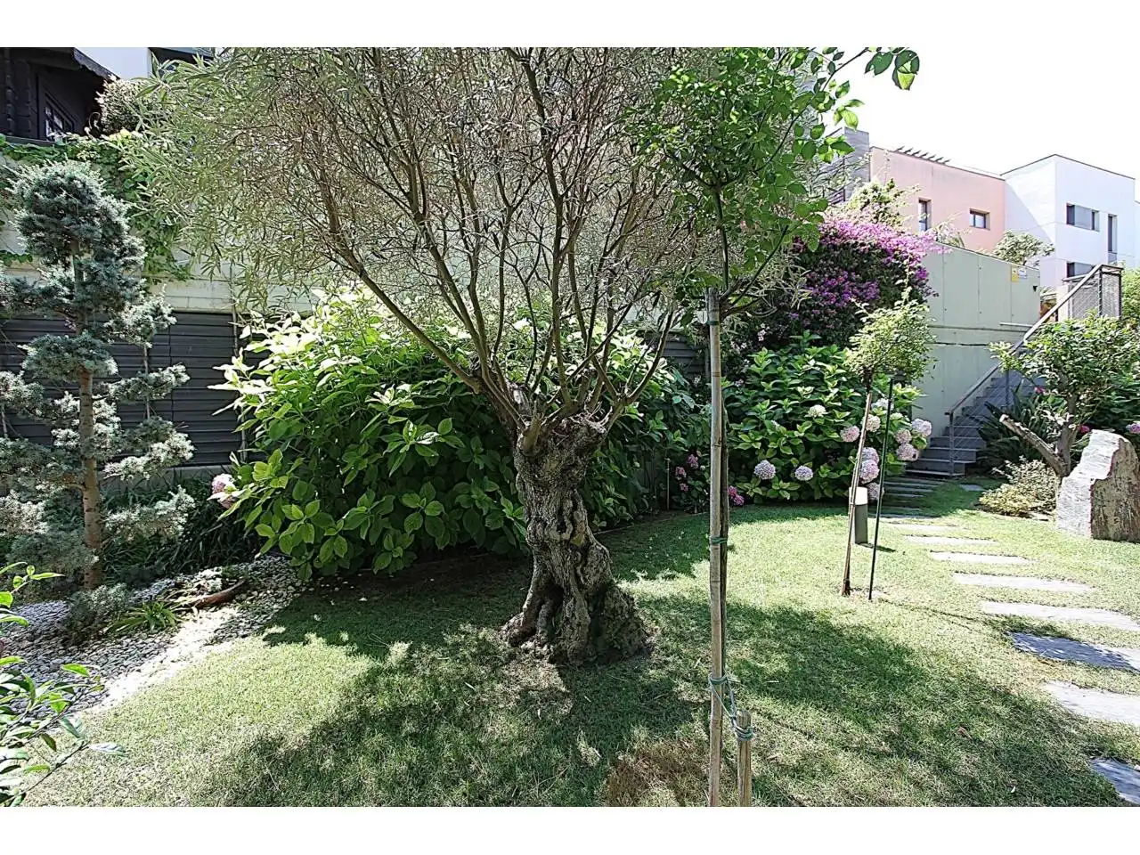 Garten von Wohnung zum Verkauf in Lloret de Mar mit Klimaanlage, Heizung und Privatgarten