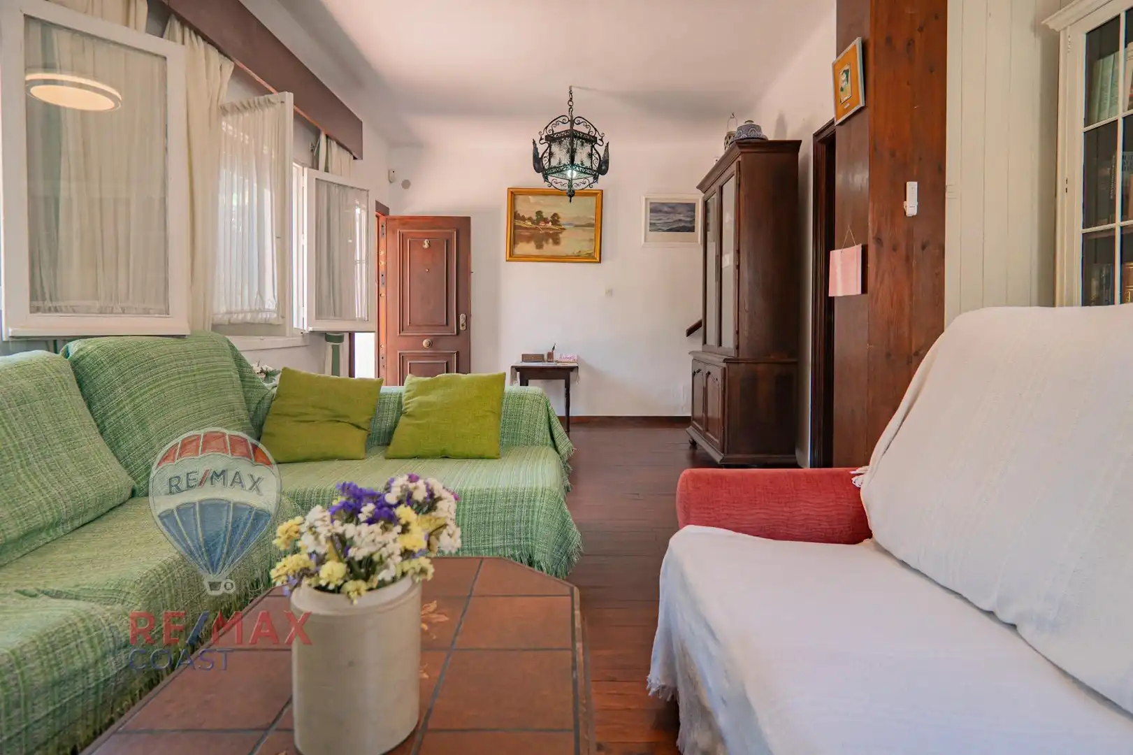 Sala de estar de Casa adosada en venta en Málaga con Aire acondicionado, Jardín privado y Terraza