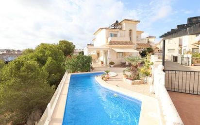 Swimming pool of House or chalet for sale in Orihuela  with Air Conditioner, Heating and Private garden