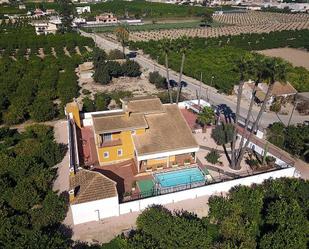 Vista exterior de Finca rústica en venda en Orihuela amb Aire condicionat, Terrassa i Piscina