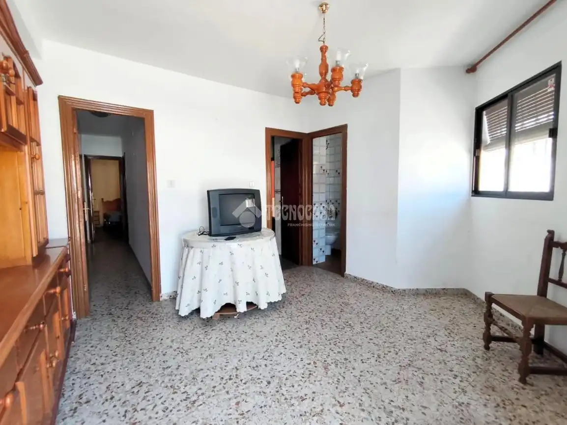 Sala de estar de Casa adosada en venta en Guadix