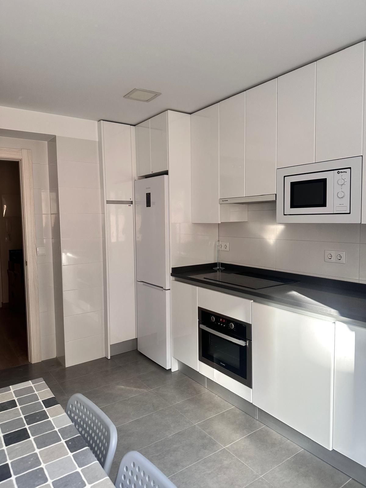 Kitchen of Flat to share in Burgos Capital  with Heating and Terrace