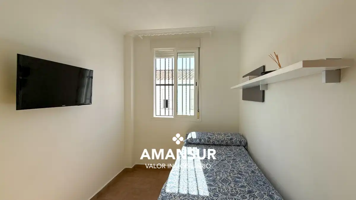 Habitación de Casa adosada en venta en Cartaya con Terraza y Alarma