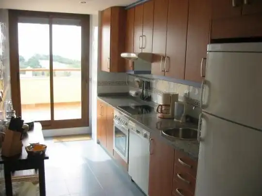 Kitchen of Duplexes for sale in Benalmádena  with Air Conditioner, Terrace and Community pool