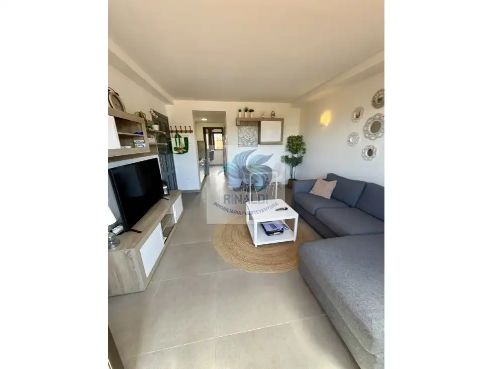 Sala de estar de Apartamento en venta en La Oliva con Terraza, Piscina y Amueblado