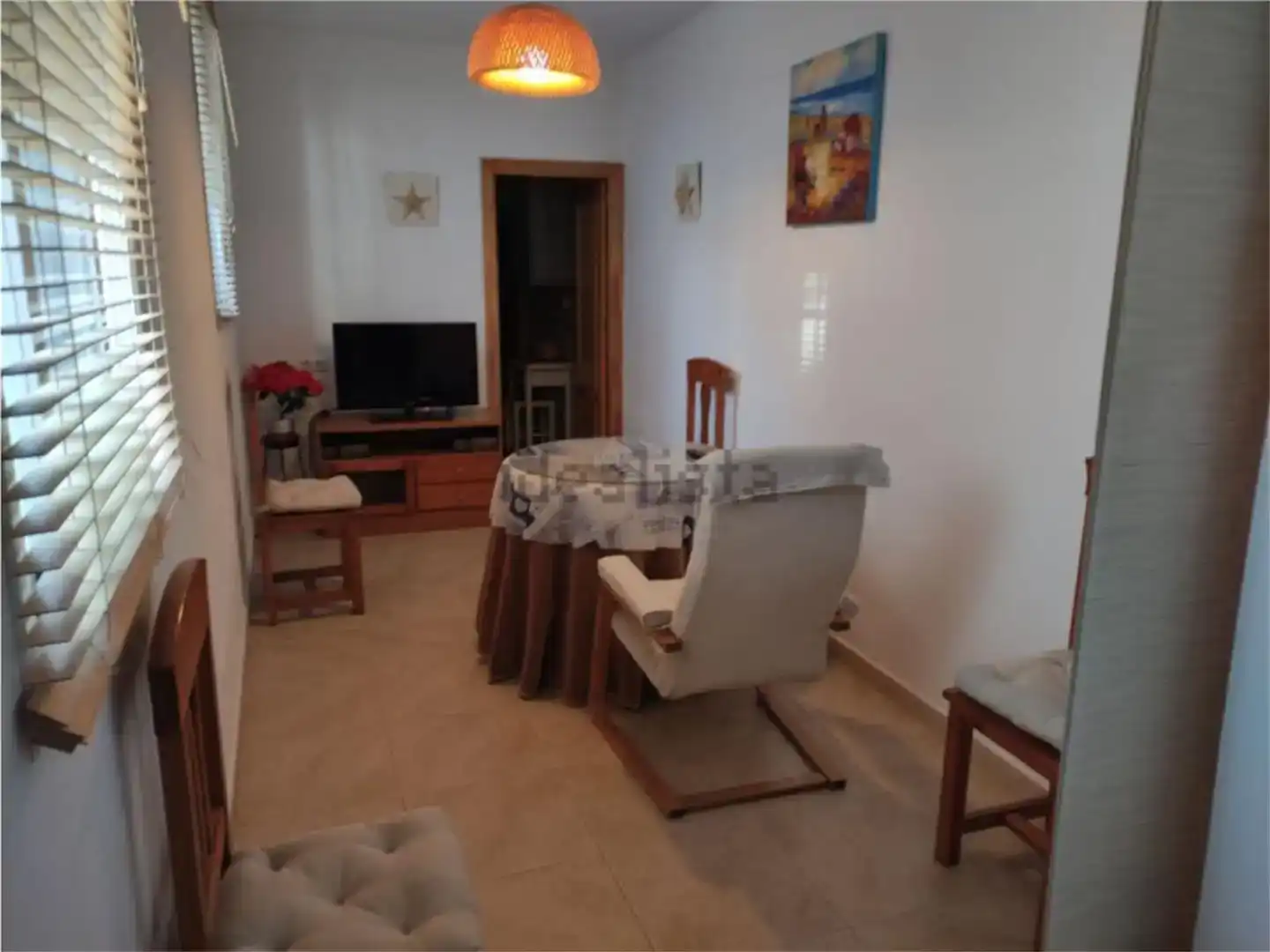 Sala de estar de Casa adosada en venta en Gilena con Aire acondicionado y Amueblado