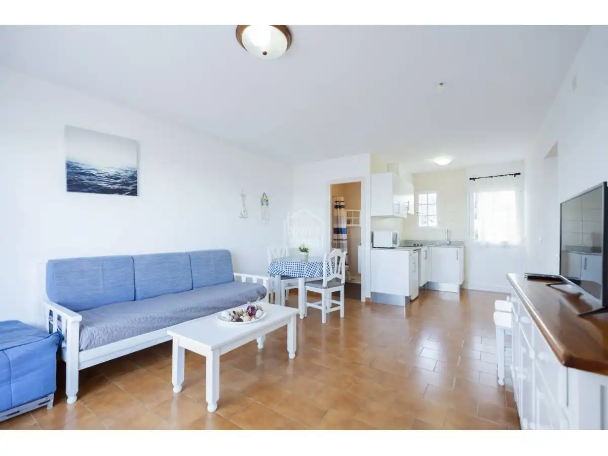 Sala d'estar de Apartament en venda en Es Mercadal amb Jardí privat, Terrassa i Piscina