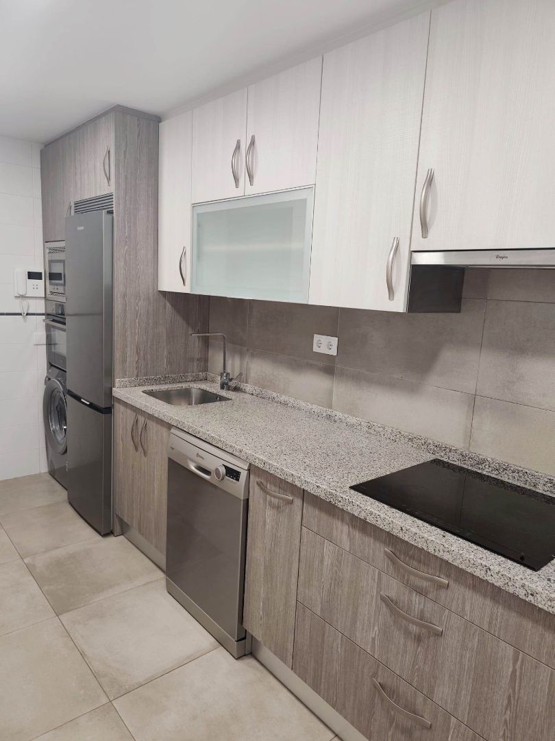 Kitchen of Flat to rent in Gijón   with Heating, Parquet flooring and Oven