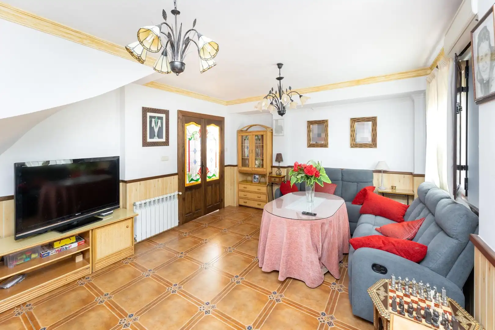 Sala d'estar de Casa adosada en venda en Peligros amb Aire condicionat, Jardí privat i Terrassa
