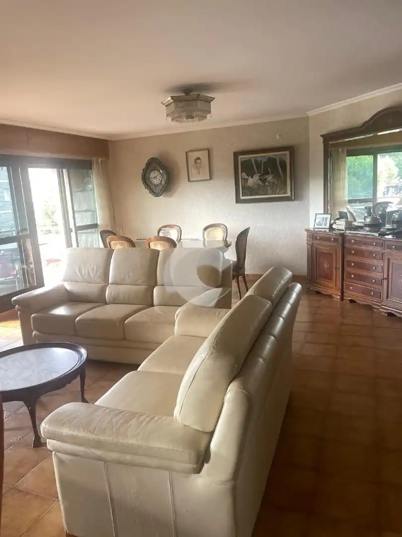 Sala d'estar de Casa o xalet en venda en Entrimo amb Calefacció, Jardí privat i Traster