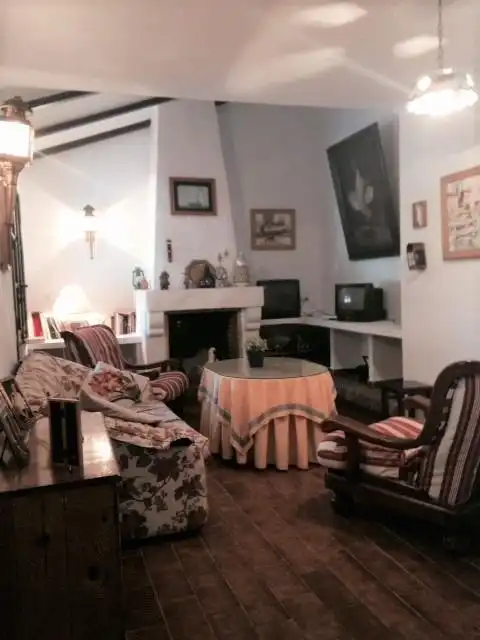Sala d'estar de Casa o xalet en venda en Chiclana de la Frontera amb Jardí privat i Piscina comunitària