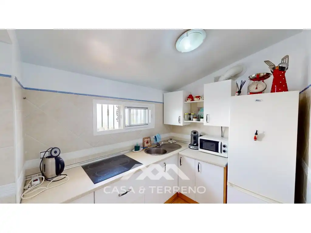 Cuina de Casa o xalet en venda en Arenas amb Aire condicionat, Jardí privat i Terrassa