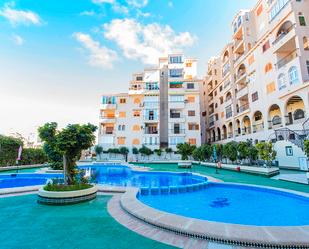 Swimming pool of Flat for sale in Torrevieja  with Air Conditioner, Heating and Terrace