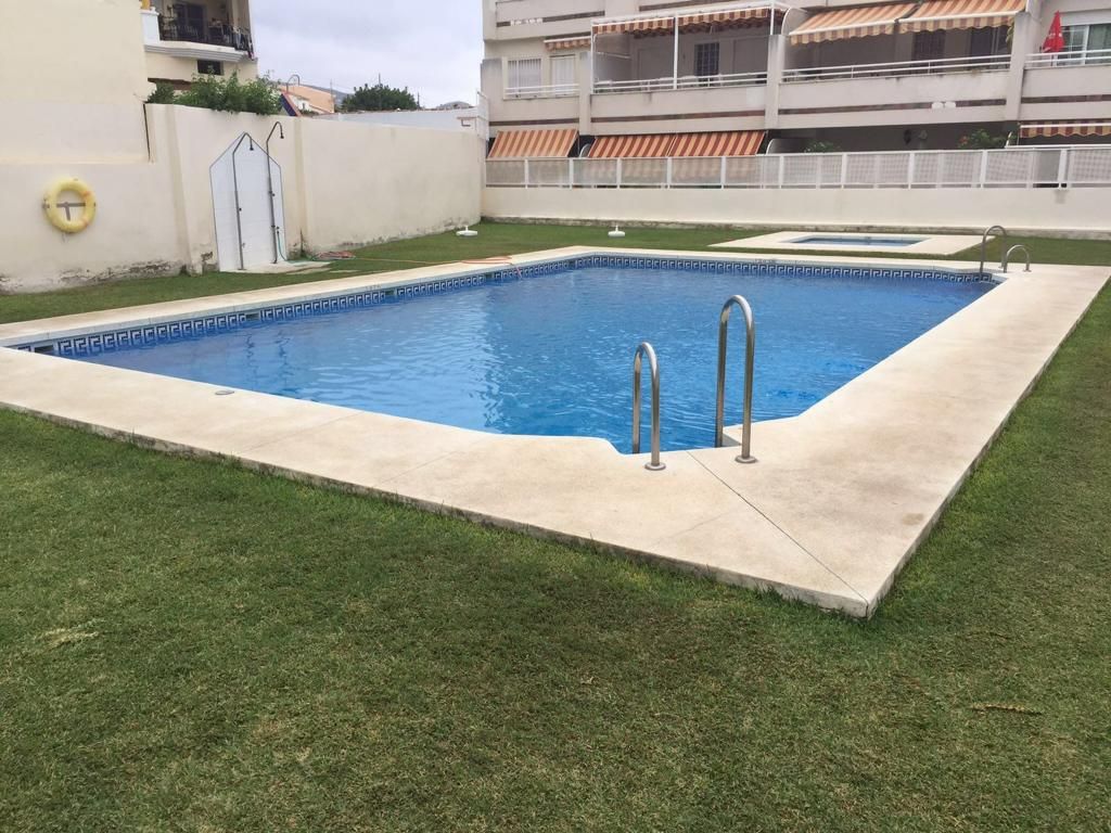 Swimming pool of Apartment to rent in Torrox  with Air Conditioner, Heating and Terrace