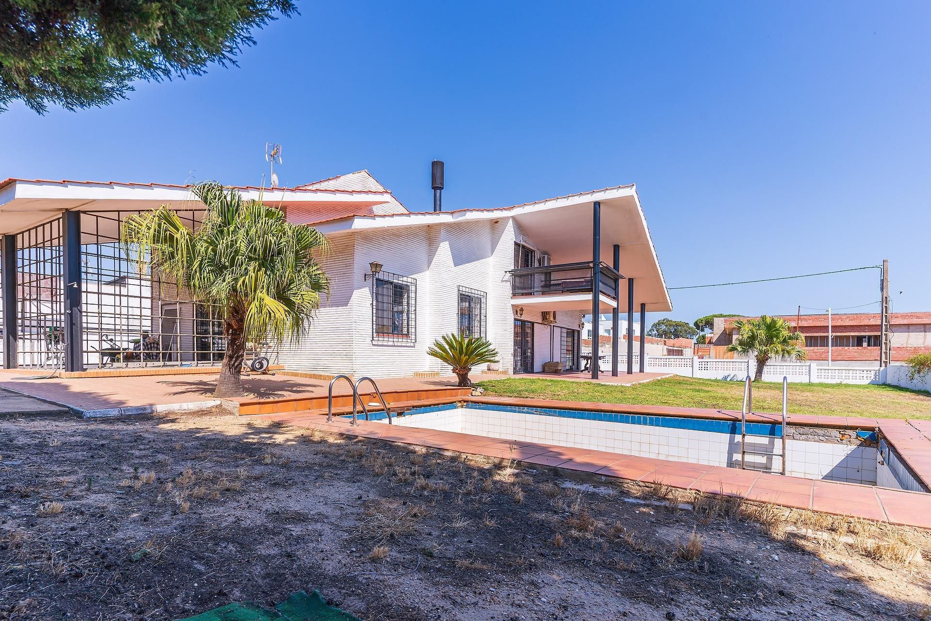 Vista exterior de Casa o xalet en venda en Palos de la Frontera amb Aire condicionat, Jardí privat i Terrassa