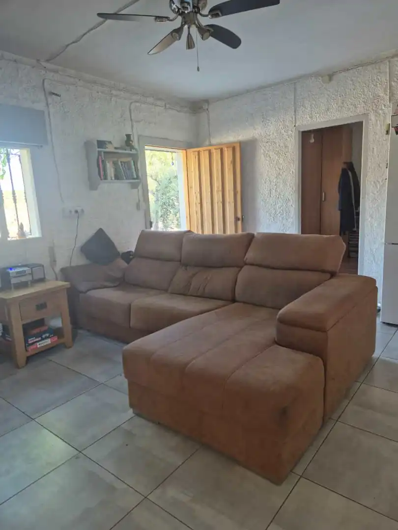 Sala d'estar de Finca rústica en venda en Líjar amb Jardí privat, Terrassa i Moblat