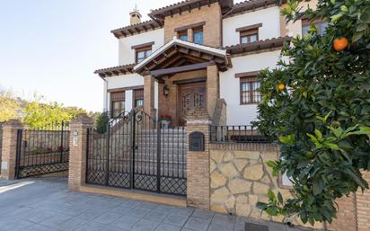 Exterior view of Single-family semi-detached for sale in Fuente Vaqueros  with Heating, Terrace and Storage room