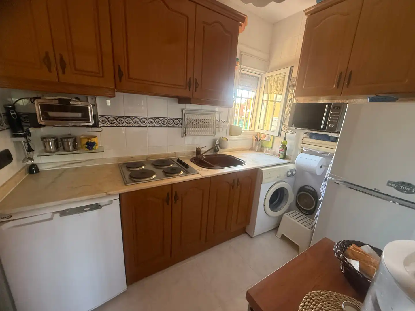 Cuina de Apartament en venda en Torrevieja amb Jardí privat, Terrassa i Moblat