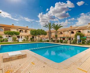 Piscina de Casa adosada en venda en Torrevieja amb Aire condicionat, Calefacció i Terrassa