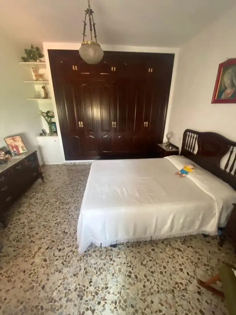 Habitación de Casa adosada en venta en Málaga con Aire acondicionado y Terraza