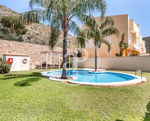 Swimming pool of Single-family semi-detached for sale in Cullera  with Air Conditioner, Heating and Private garden