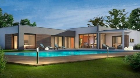 PARCELA EN VENTA  VIVIENDA DE DISEÑO CON PISCINA