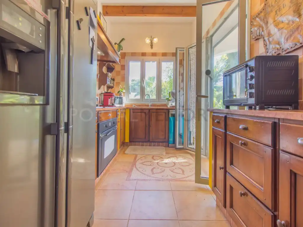 Cocina de Casa o chalet en venta en Sant Lluís con Calefacción, Jardín privado y Piscina