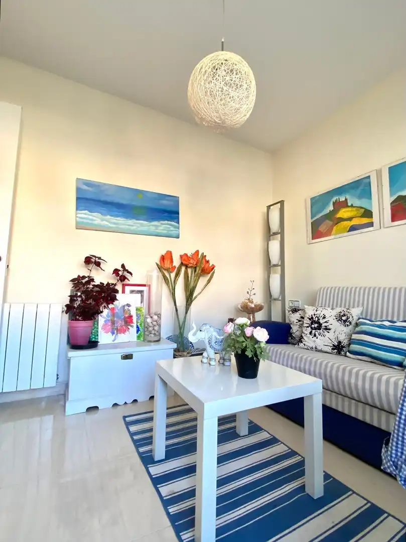 Wohnzimmer von Einfamilien-Reihenhaus zum Verkauf in El Vendrell mit Klimaanlage, Heizung und Terrasse