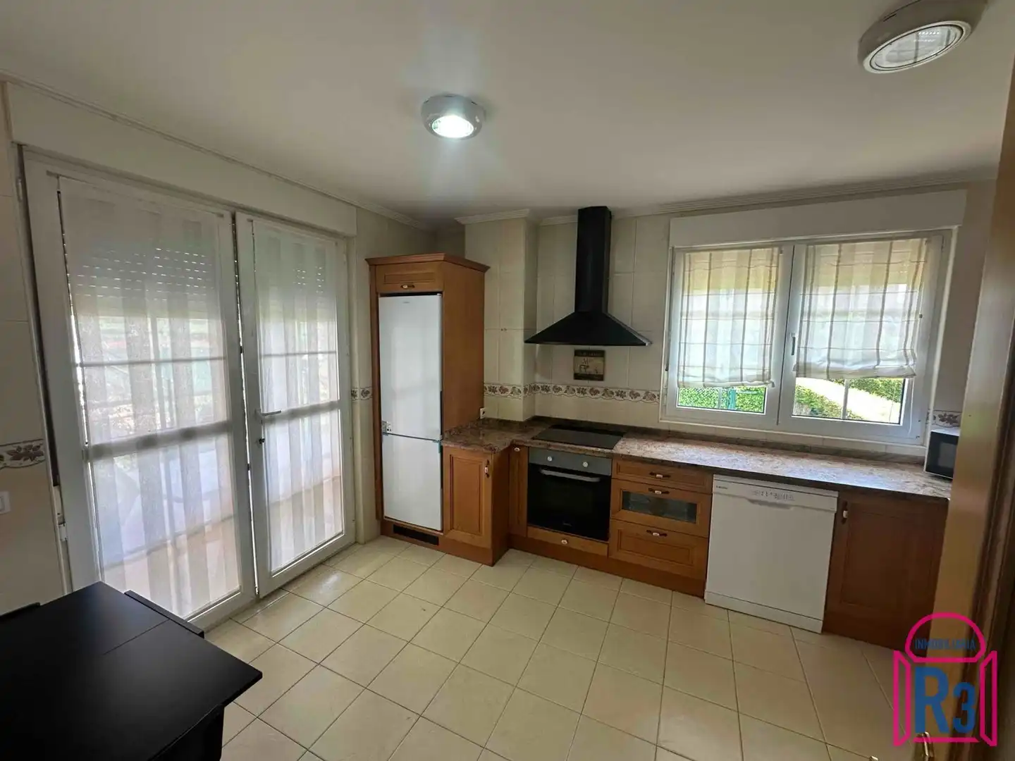 Cocina de Casa adosada en venta en Villaquilambre con Calefacción, Piscina y Amueblado