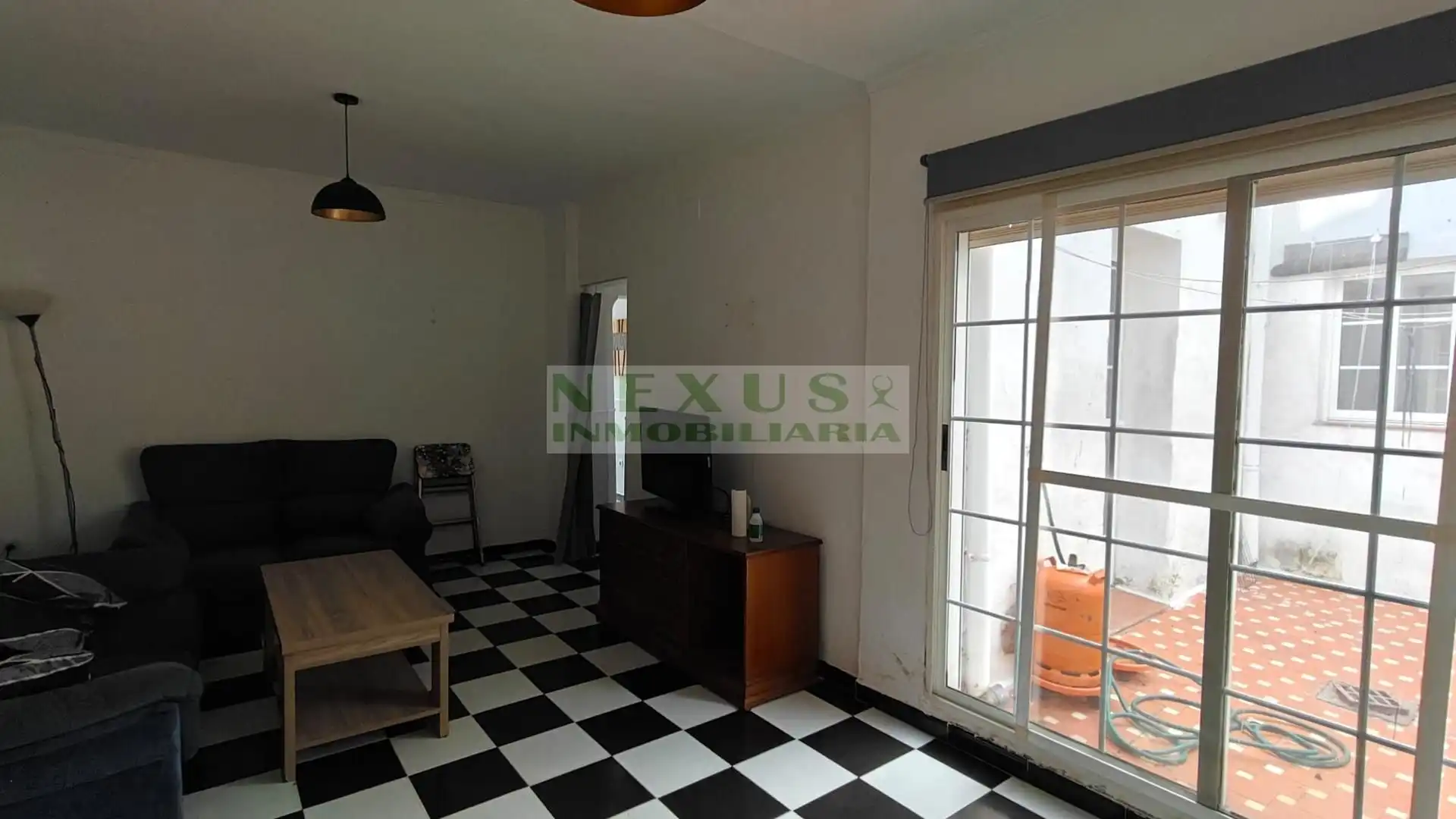 Sala de estar de Casa adosada en venta en Cáceres