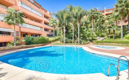 Swimming pool of Attic for sale in Marbella  with Air Conditioner, Terrace and Storage room