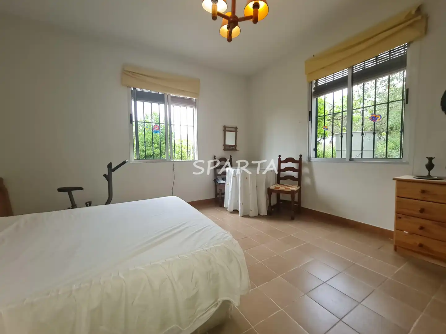 Schlafzimmer von Country house zum Verkauf in Sanlúcar la Mayor mit Privatgarten, Schwimmbad und Ofen