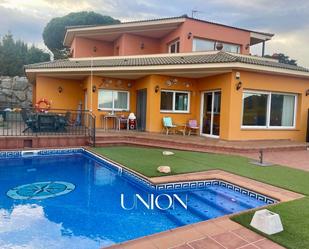 Swimming pool of House or chalet for sale in Calella  with Air Conditioner, Heating and Private garden