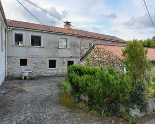 Vista exterior de Casa adosada en venda en Curtis amb Jardí privat i Traster