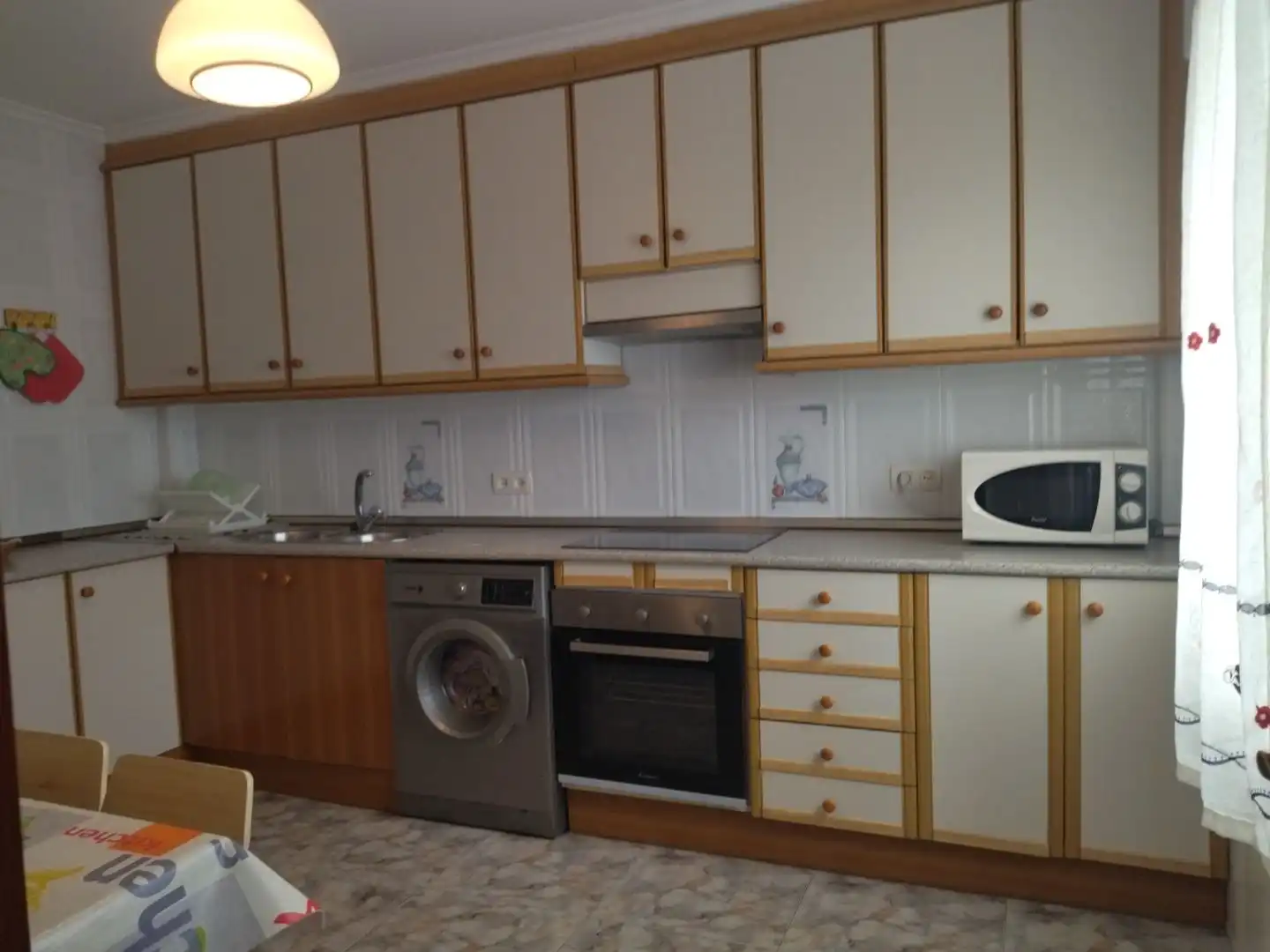 Kitchen of Attic for rent in Gijón   with Heating, Terrace and Furnished