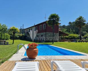 Vista exterior de Casa o xalet en venda en A Cañiza   amb Calefacció, Jardí privat i Terrassa