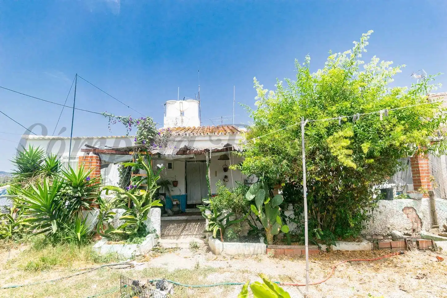 Casa con jardín en venta en Almayate