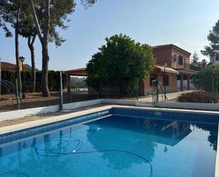 Swimming pool of House or chalet for sale in Genovés  with Air Conditioner, Heating and Private garden