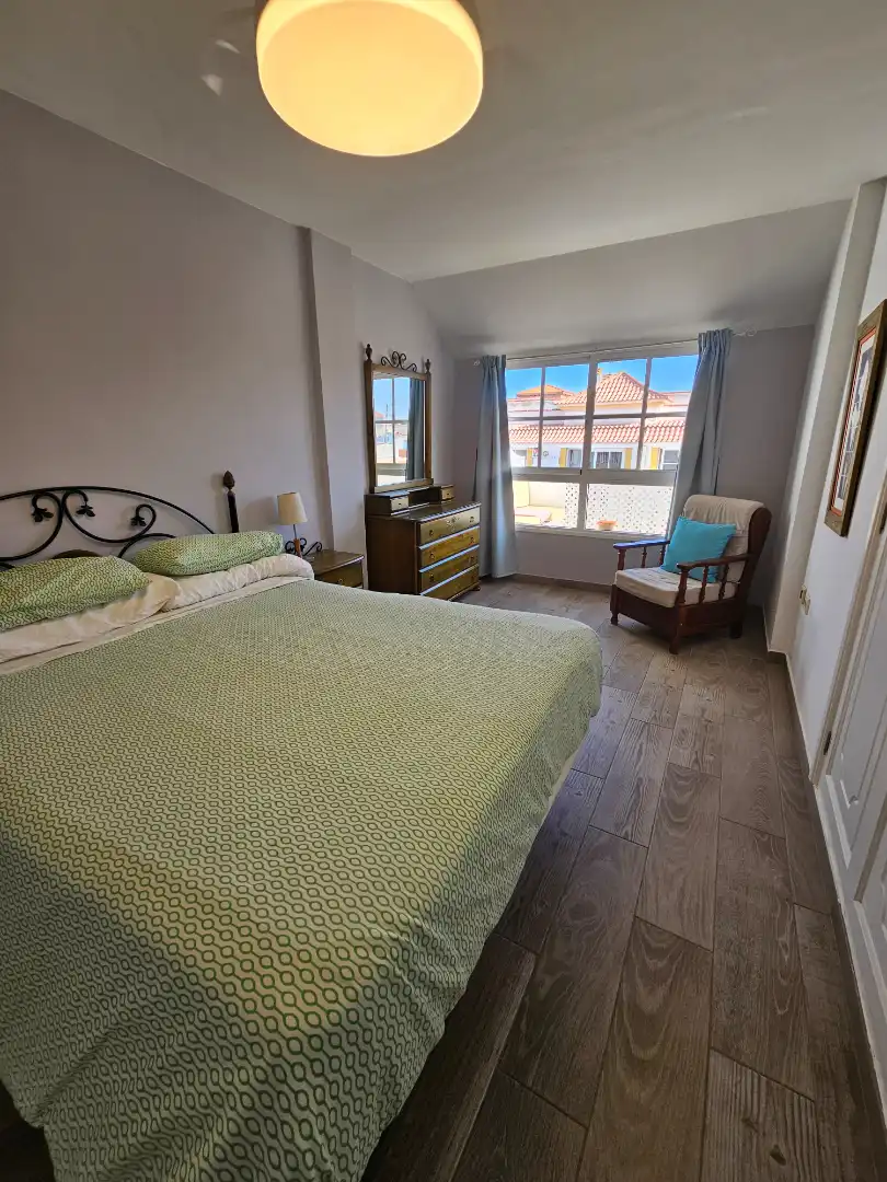 Dormitori de Apartament de lloguer en Antigua amb Moblat, Balcó i Piscina comunitària