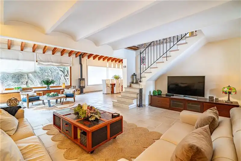 Sala d'estar de Casa o xalet en venda en Calvià amb Aire condicionat, Jardí privat i Terrassa