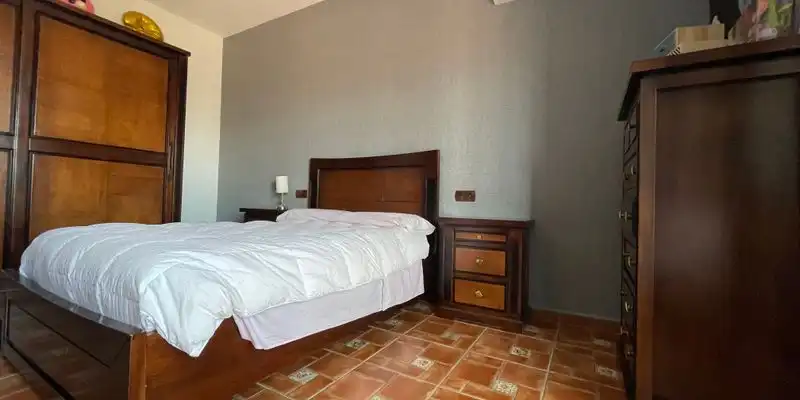 Dormitori de Casa o xalet en venda en Loja amb Aire condicionat, Jardí privat i Terrassa