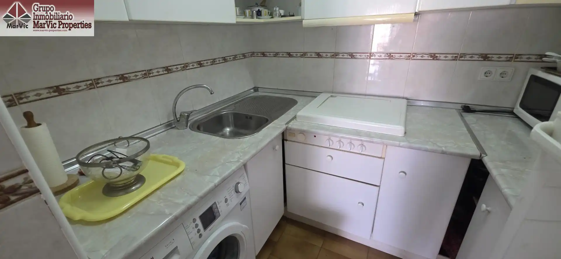 Cocina de Apartamento en venta en Benidorm con Aire acondicionado, Jardín privado y Amueblado