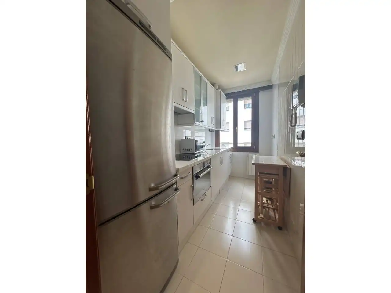 Cuina de Apartament en venda en Oviedo  amb Calefacció, Parquet i Moblat