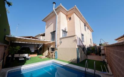 Exterior view of Single-family semi-detached for sale in Ogíjares  with Air Conditioner, Terrace and Swimming Pool