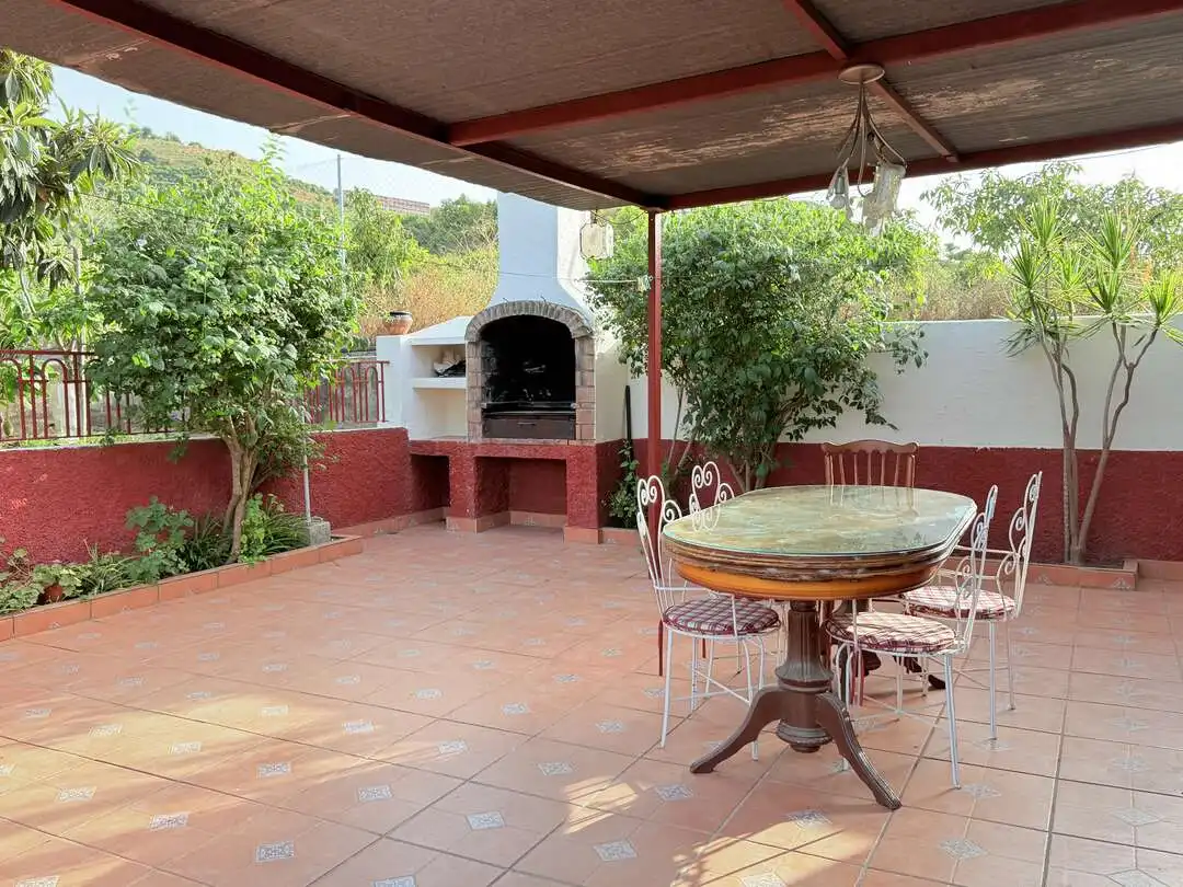 Terrassa de Casa o xalet en venda en Benamocarra amb Jardí privat i Moblat