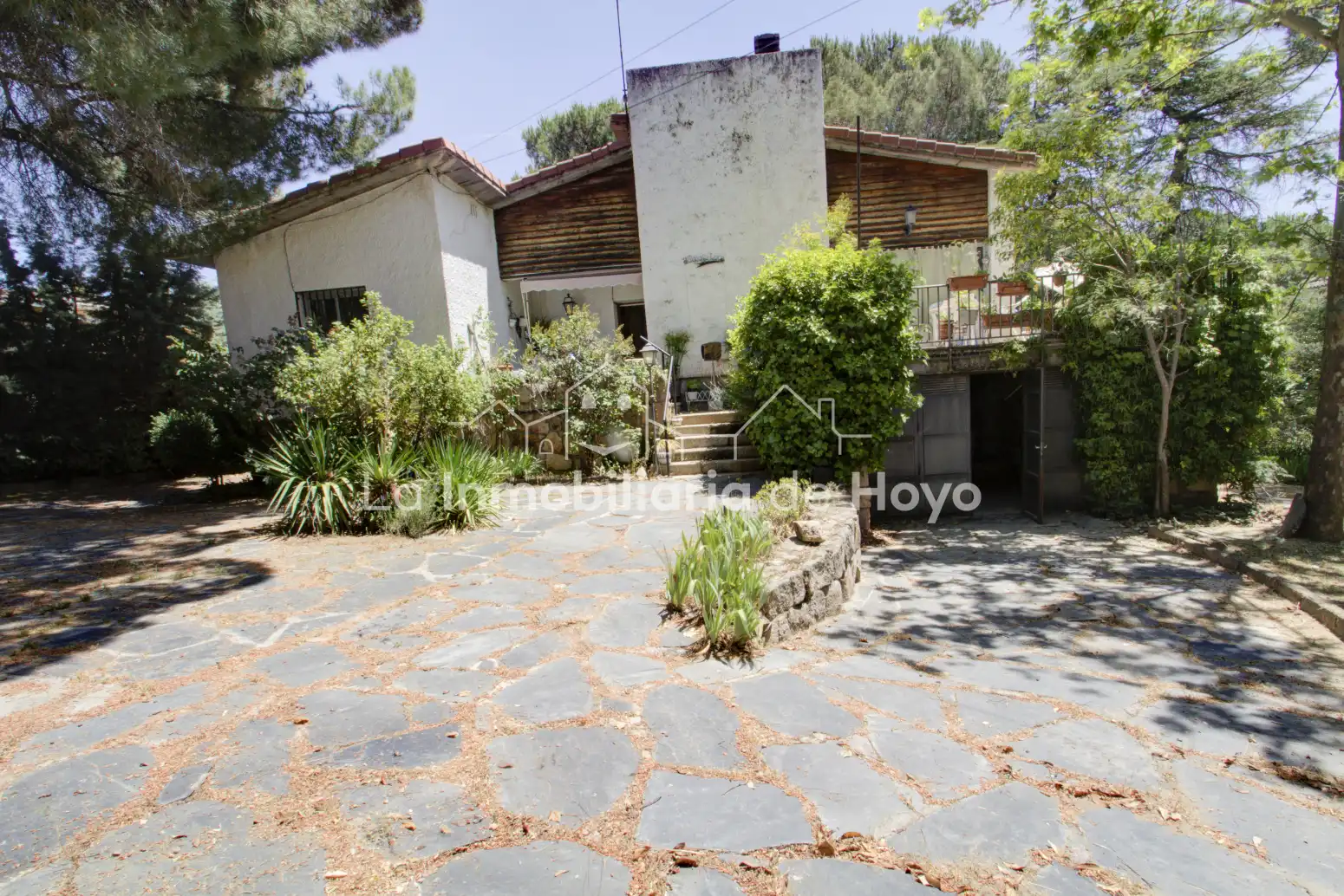 Vista exterior de Casa o chalet en venta en Hoyo de Manzanares con Calefacción, Jardín privado y Terraza