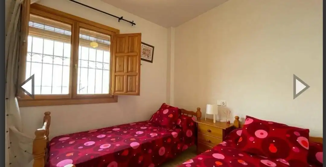Habitación de Casa adosada en venta en Pilar de la Horadada con Aire acondicionado, Calefacción y Jardín privado