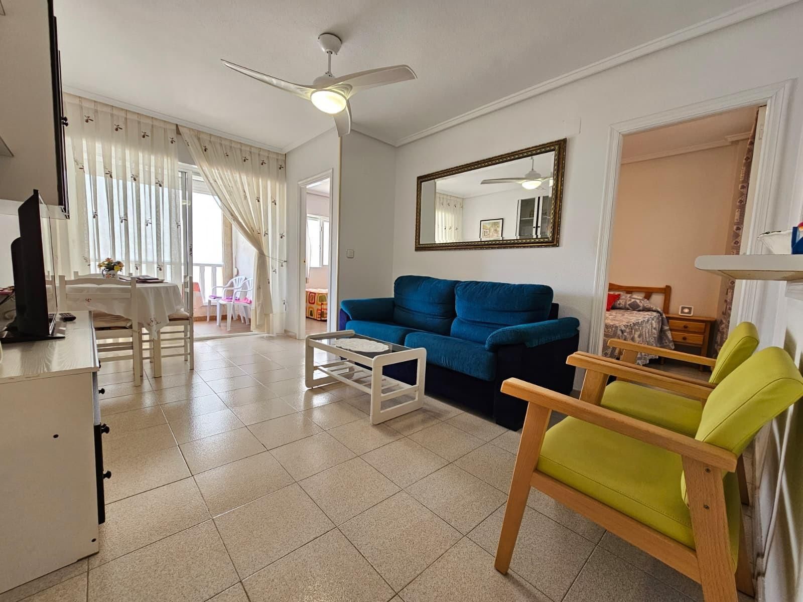 Sala de estar de Apartamento en venta en Torrevieja con Terraza, Alarma y Piscina comunitaria