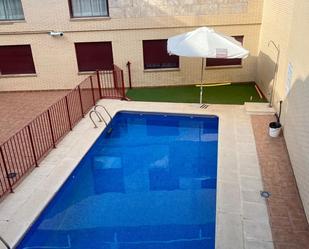 Swimming pool of Duplex for sale in Malagón  with Air Conditioner, Heating and Terrace