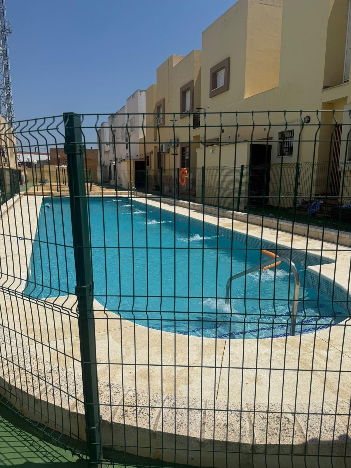 Swimming pool of Single-family semi-detached for sale in Puebla de Guzmán  with Terrace, Storage room and Community pool